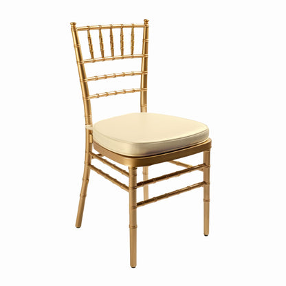 A photograph of modern Chiavari chairs with cream cushions available for event rentals.