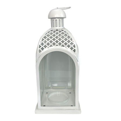 White table lantern with candle and floral ring. Available to rent in Nassau County New York