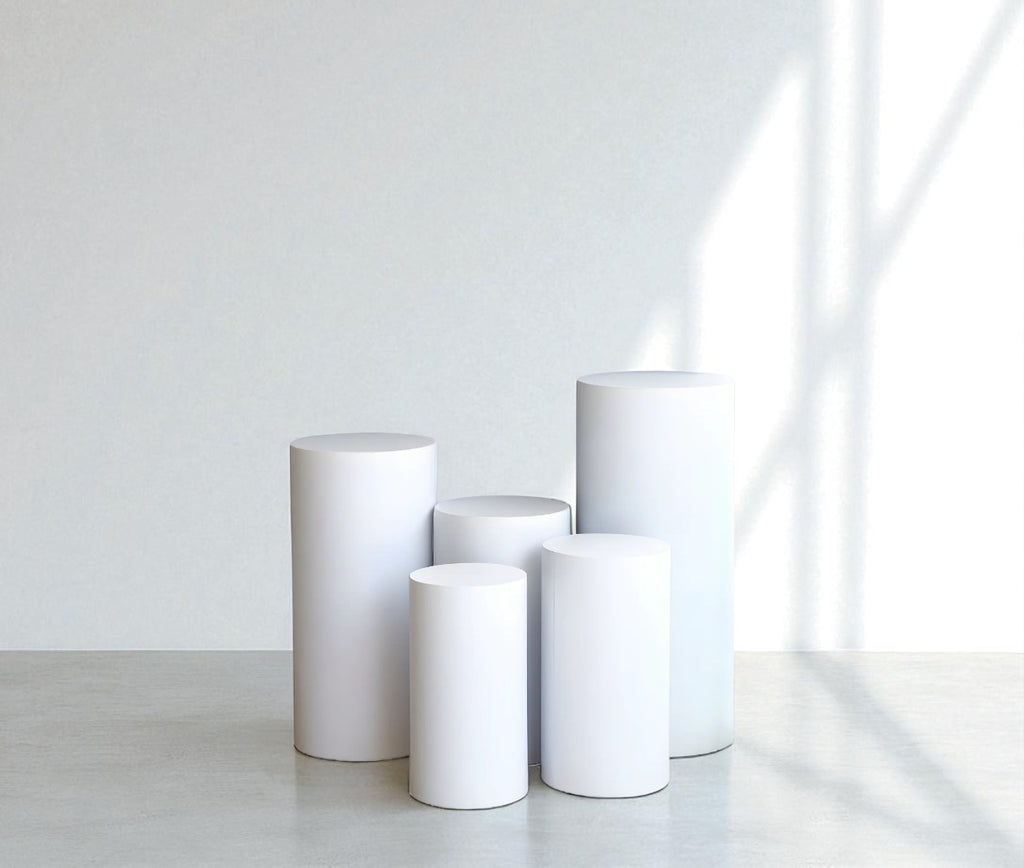 White Circular Pedestal Stands Set of 5 - Rental